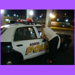 Cheryle Talking to Police Car.jpg